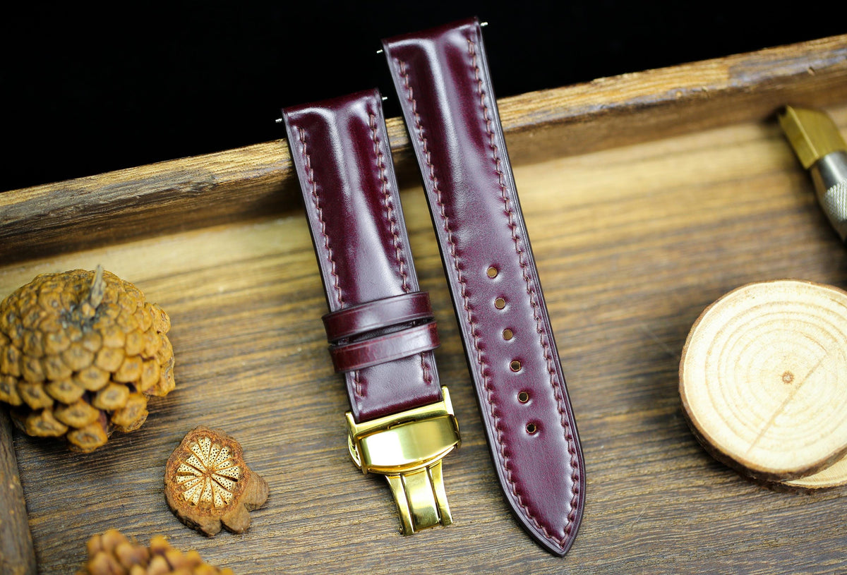 oxblood cherry red shell cordovan leather watch strap with gold clasp, long and short piece